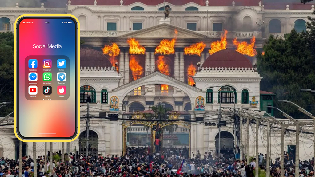 Large crowd of protesters gathered in front of historic Nepalese government building during social media ban demonstrations